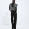 Blekta svarta jeans med vida ben Blekta svarta jeans med vida ben