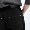 Blekta svarta jeans med vida ben Blekta svarta jeans med vida ben