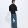 Jeans i medium indigotvättad denim med utsvängda ben