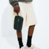 Liten Intrecciato-pouch med handledsrem Liten Intrecciato-pouch med handledsrem