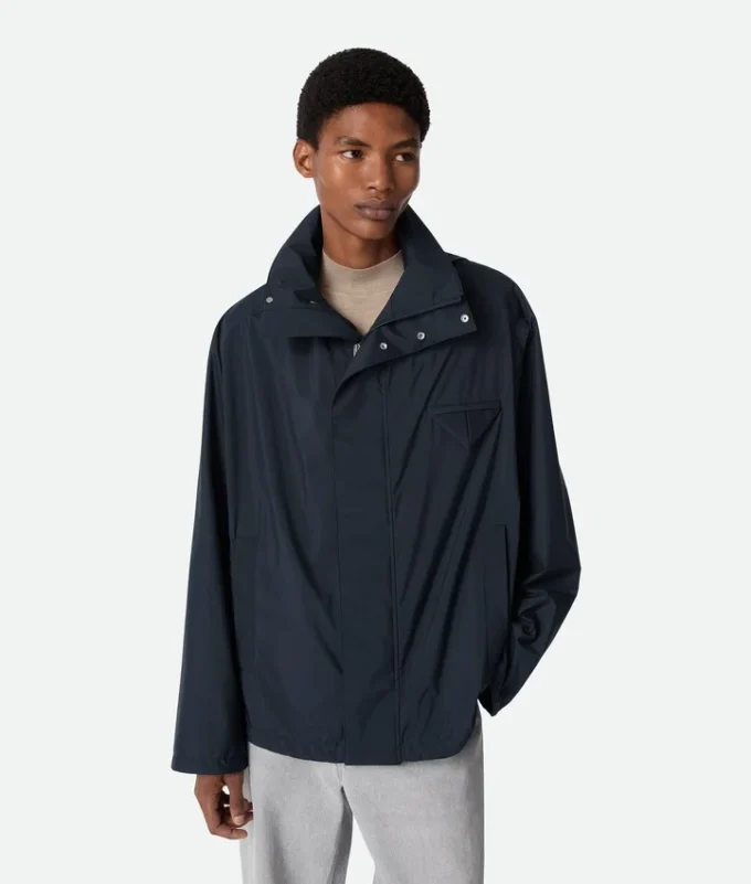 Packbar nylonblouson med huva Packbar nylonblouson med huva