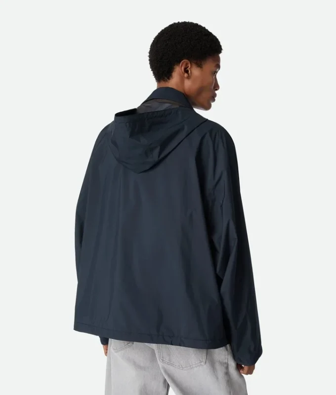 Packbar nylonblouson med huva Packbar nylonblouson med huva