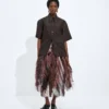 Läderkjol med broderade fransar Läderkjol med broderade fransar